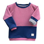 Mitwachsender Kuschelpulli für Kinder aus Bio-Baumwolle in Lila Blau von der Marke Oktopulli im Unisex-Schnitt 